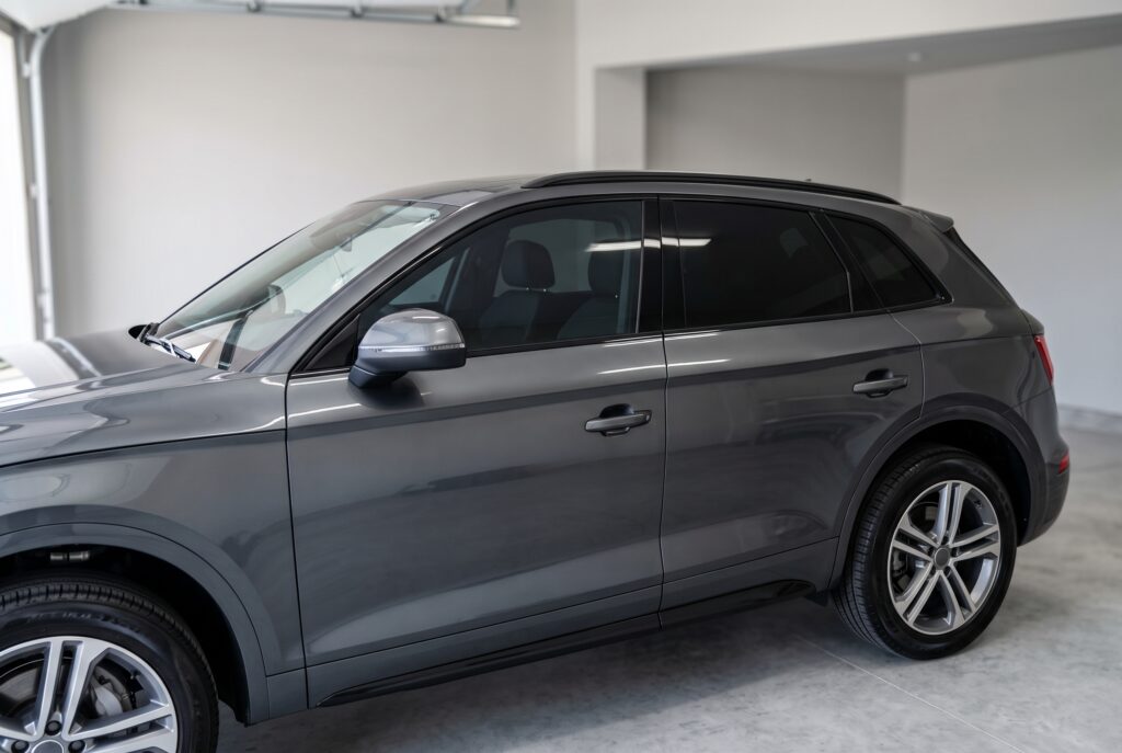 Automotive window tinting on vehicle side glass