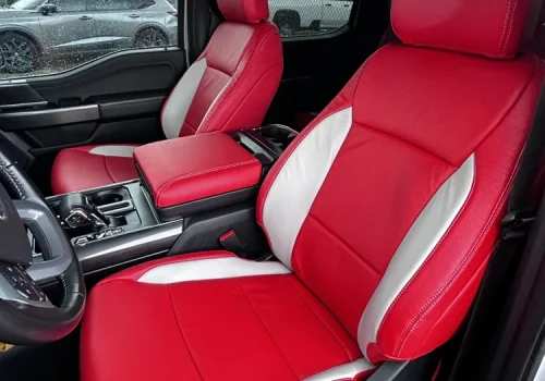 Red and white Katzkin leather seat upholstery with contrasting stitching