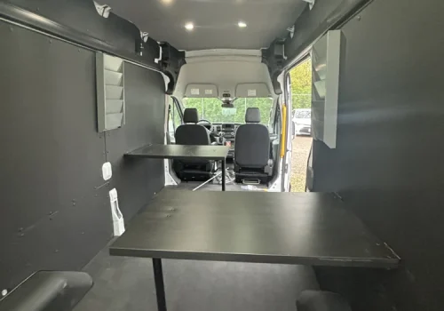 Protective floor and wall liners installed inside a commercial van